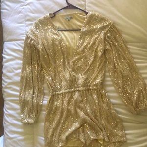 Never worn before sequin romper